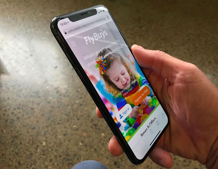 Flybuys homepage on a mobile phone